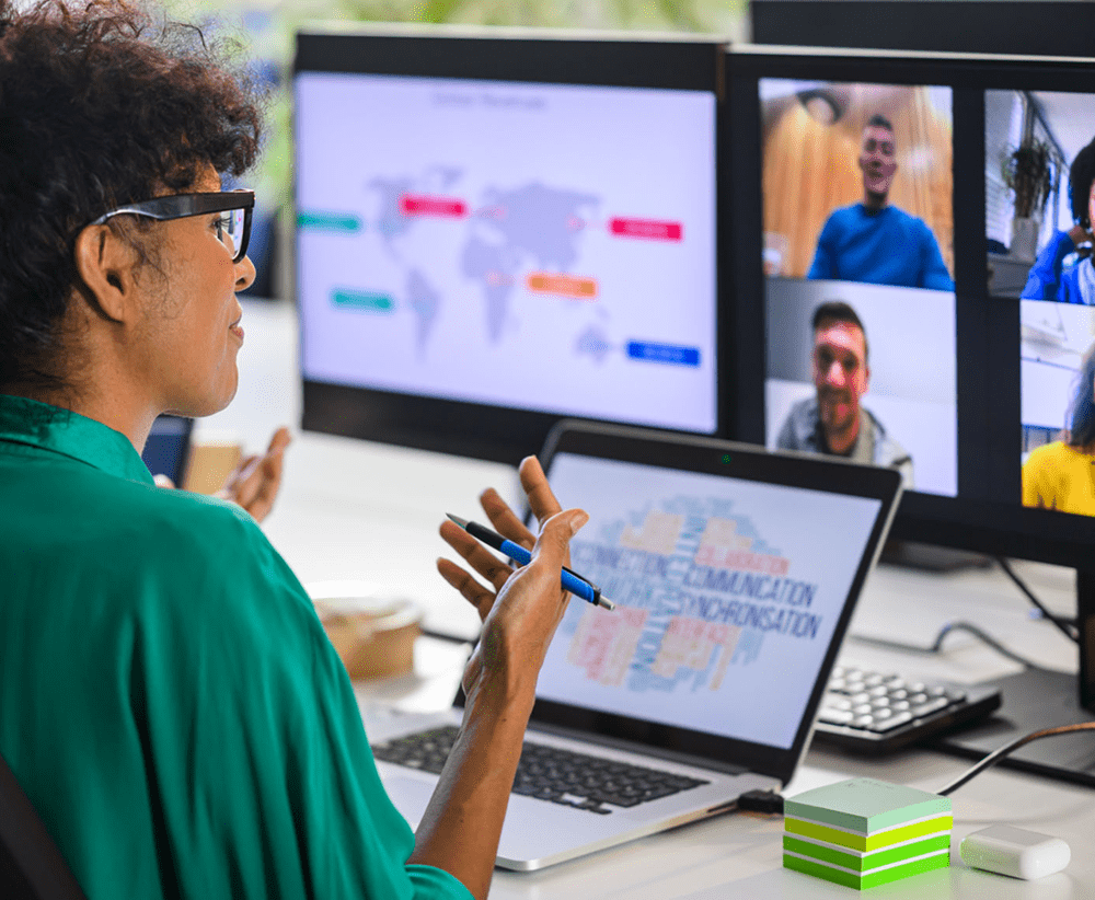 Person participating in a video conference meeting.